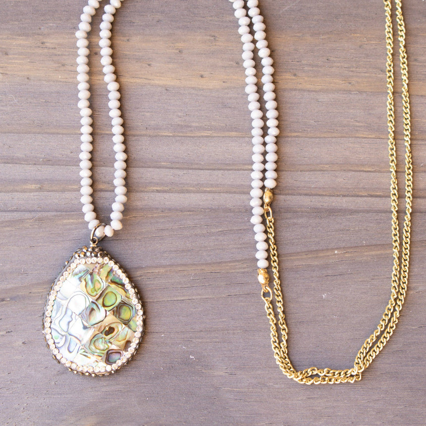 Grey Crystal Beaded Necklace With Crystal Rhinestone Druzy Rainbow Shell Pendant - Arlo and Arrows